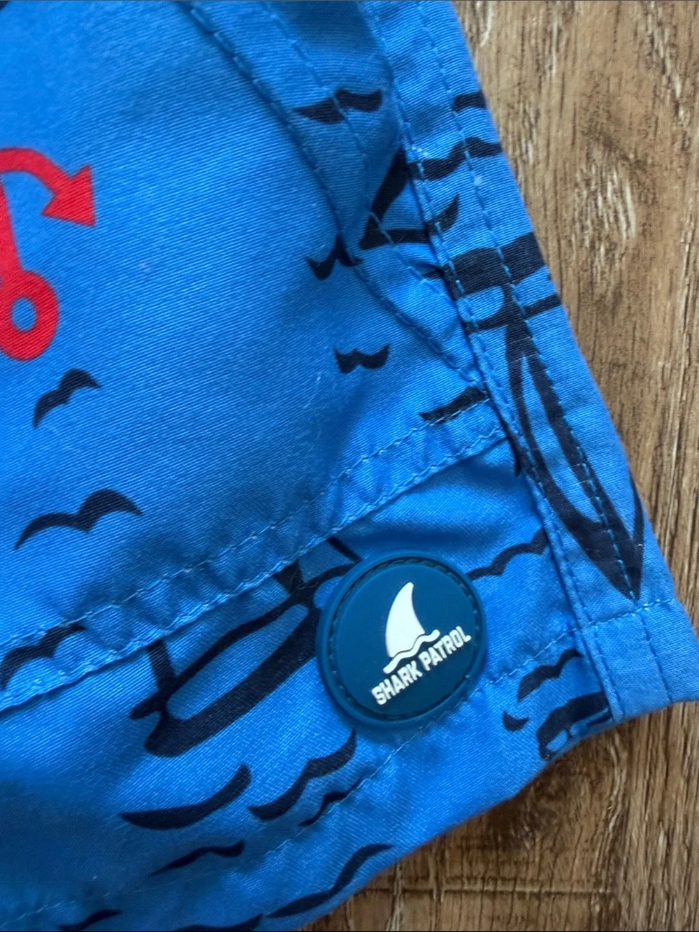 Kids Red Long-Sleeve Rash Guard with Blue Sailboat Swim Shorts